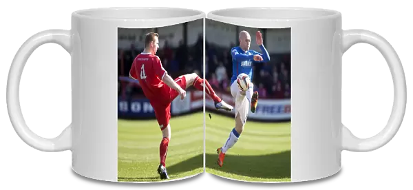 Clash on the Pitch: A Battle for the Ball - Rangers Nicky Law vs Brechin City's Graham Hay (Scottish League One, 2003)