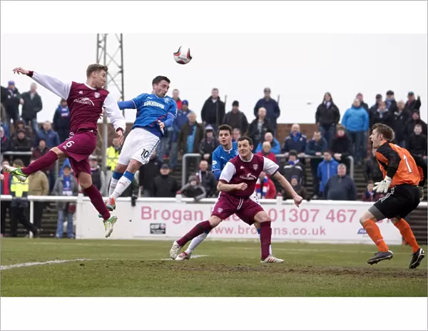 Rangers Nicky Clark Scores the Winning Header: Scottish Cup Victory at Arbroath's Gayfield Park (2003)