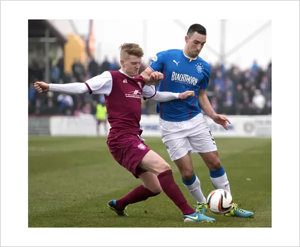 Clash at Gayfield Park: A Battle for the Ball - Rangers Lee Wallace vs Arbroath's Johnny Lindsay (Scottish League One Scottish Cup)
