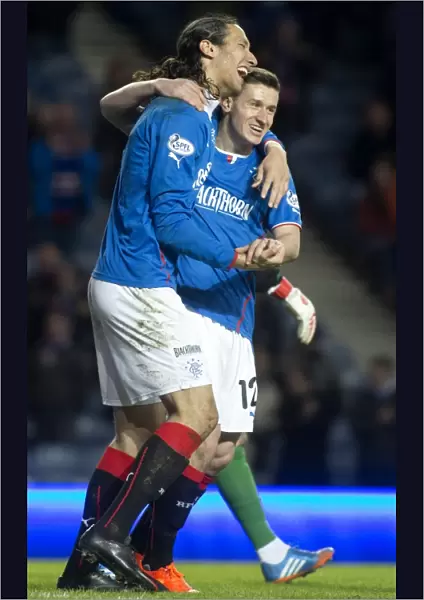 Rangers Football Club: Mohsni and Aird Celebrate Thrilling Goal at Ibrox Stadium - Scottish League One