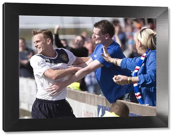 Scottish League One Glory: Dean Shiels Scottish Cup-Winning Goal Celebration at Ochilview Park