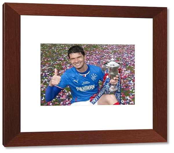 Rangers Football Club: Emilson Cribari's Triumphant Double Victory with League One Title and Scottish Cup at Ibrox Stadium