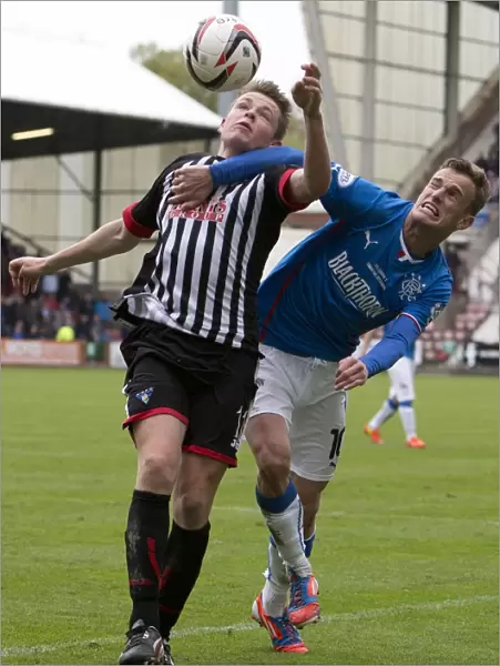 Battle for the Ball: Dean Shiels vs. Ross Millen - Scottish League One Rivalry (Scottish Cup, 2003)