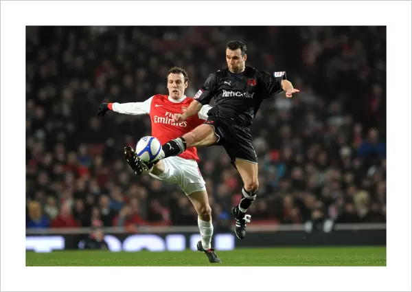 Sebastien Squillaci (Arsenal) Scott McGleish (Orient). Arsenal 5: 0 Leyton Orient