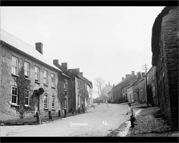 A view up the hill, Fore Street, Grampound, Cornwall. Early 1900s