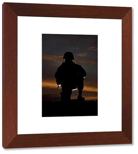 Silhouette of a U. S. Marine in uniform