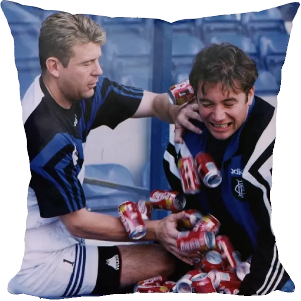 Andy Goram and Ally McCoist horsing around with Coca Cola cans in build up to Celtic
