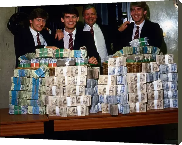 Wallace Mercer & players with pile of money February 1986