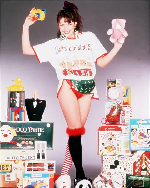 Christmas model surrounded with present ideas for Christmas, 5th December 1989