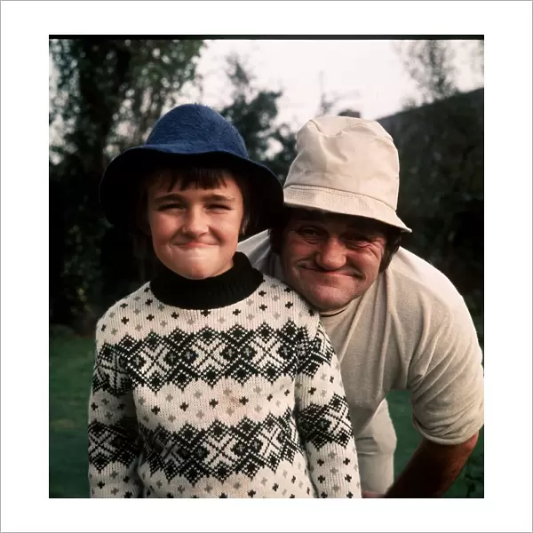 Les Dawson comedian with his son Stuart in the garden dbase msi