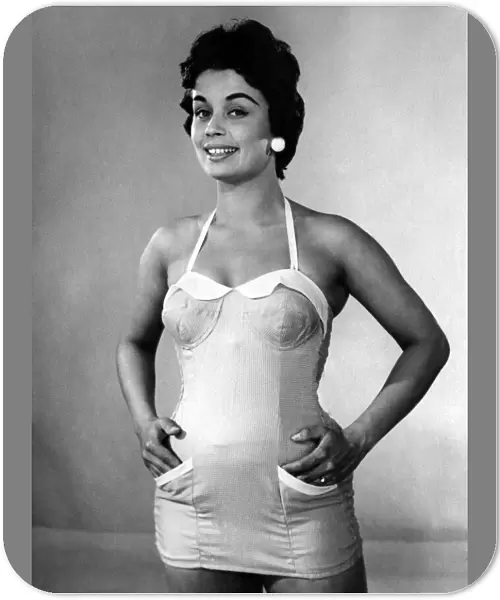 Clothing Fashion 1955. Woman modelling swimming costumes. P015133
