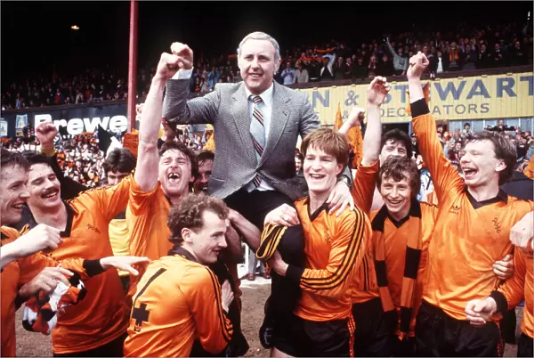 Paul Hegarty and Richard Gough give their manager a lift as they hold up Dundee United