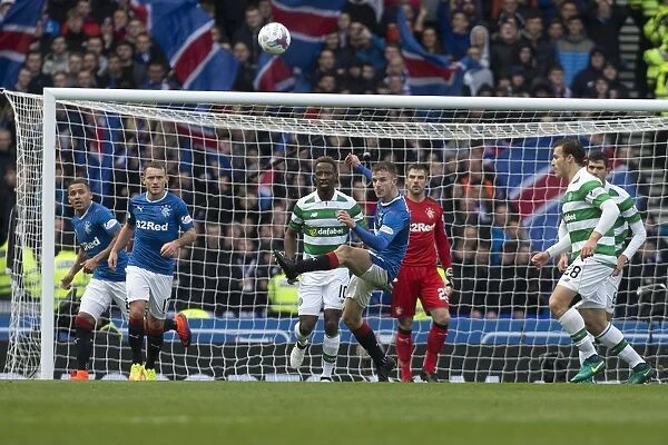 Andy Halliday Clears Ball in Intense Rangers vs Celtic Betfred Cup Semi-Final at Hampden Park