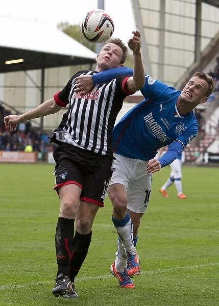 Battle for the Ball: Dean Shiels vs. Ross Millen - Scottish League One Rivalry (Scottish Cup, 2003)
