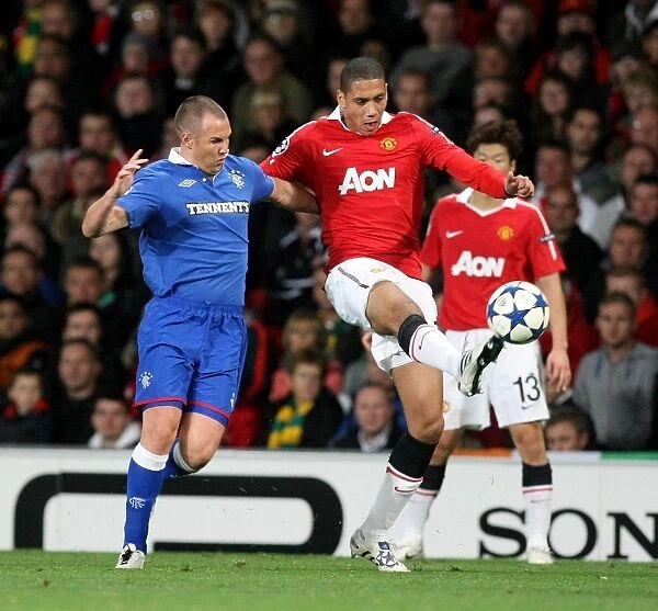 Battle for the Ball: Kenny Miller vs. Chris Smalling - Rangers vs. Manchester United, UEFA Champions League, Group C, Old Trafford