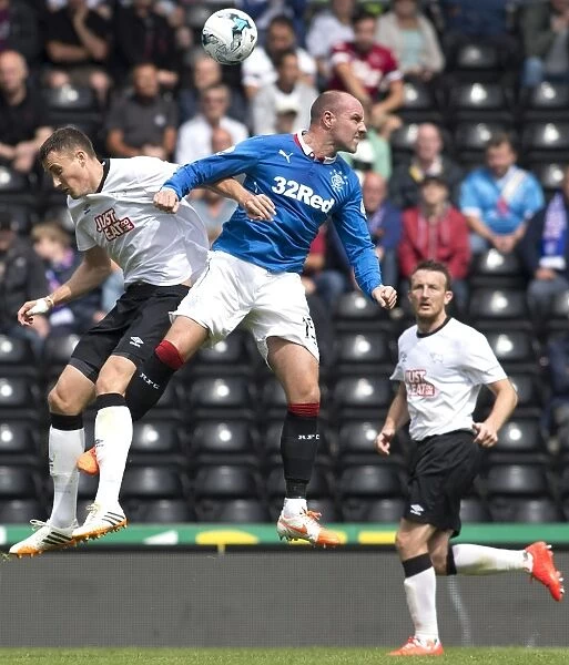 A Battle for the Ball: Rangers vs Derby County at Ipro Stadium - Scottish Cup Champions Clash