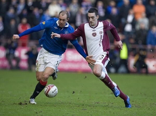 Battle for the Ball: Whittaker vs. Wallace in Hearts vs. Rangers Rivalry (1-0) at Tynecastle