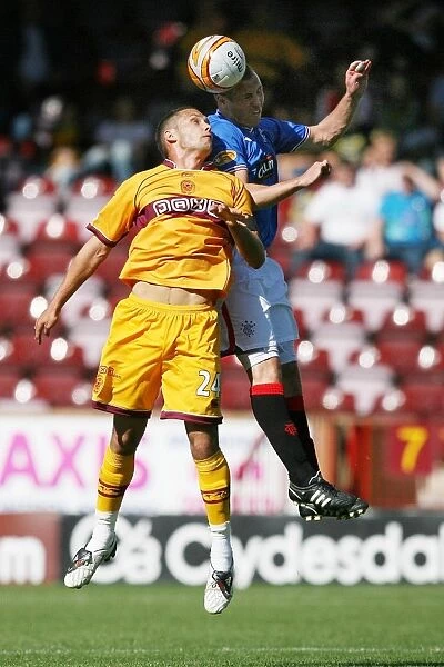 A Battle at Fir Park: Rangers vs Motherwell - 0-0 Stalemate: Head-to-Head Clash Between Kenny Miller and Tom Hateley
