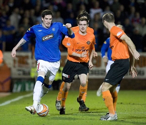 A Battle at Tannadice Park: Rangers vs Dundee United - 0-0 Stalemate: Head-to-Head Clash between Kyle Lafferty and David Robertson