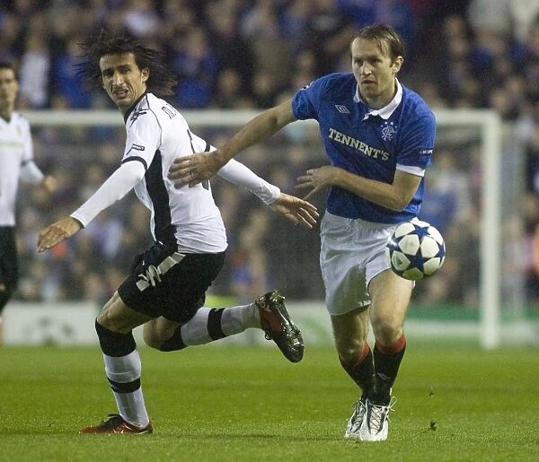 A Battle of Titans: Sasa Papac vs Mehmet Topal in the UEFA Champions League Group Stages at Ibrox (1-1)