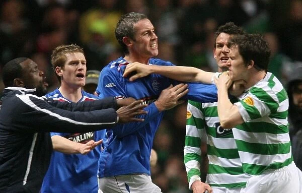 A Bittersweet Farewell: David Weir and Gary Caldwell at the Final Whistle - Celtic vs. Rangers