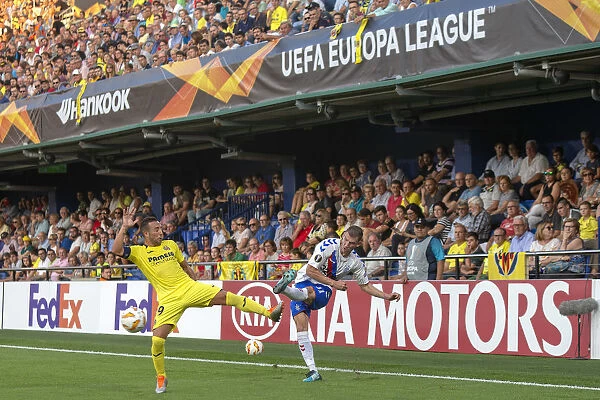 Born Again Clash: Cazorla vs. Barisic in Europa League Battle at Villarreal's Estadio de la Ceramica