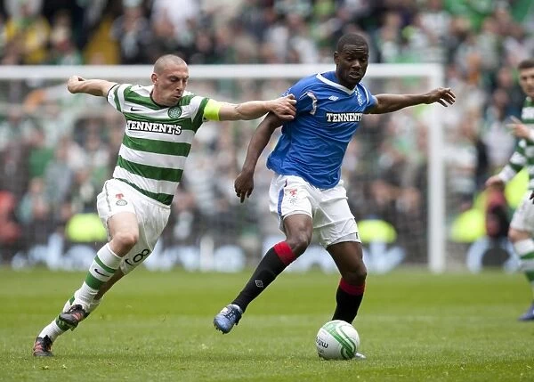 Celtic Park Rivalry Reaches a Boiling Point: Celtic's Scott Brown vs. Rangers Maurice Edu in Celtic's 3-0 Scottish Premier League Triumph