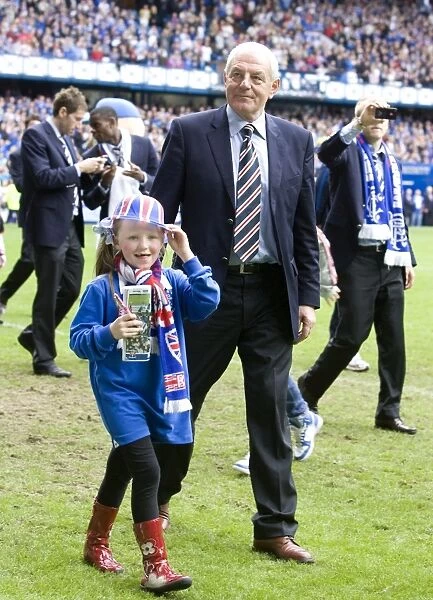 Champion Celebrations: Walter Smith and Granddaughter Jessica at Ibrox Stadium - Rangers SPL Victory (2010-11)