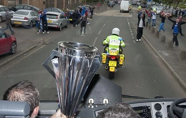Champions Triumph: Rangers Football Club Welcomes Home the SPL Trophy