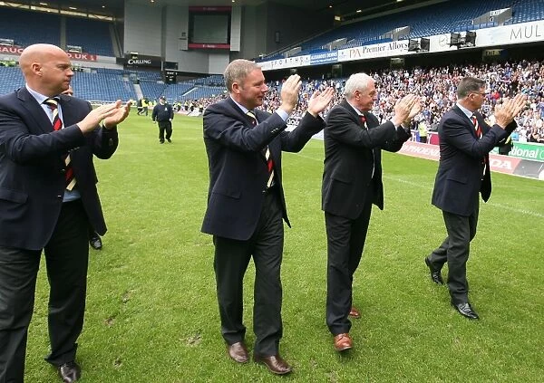 Champions Triumphant Homecoming: McDowall, Smith, and McCoist Welcome Rangers at Ibrox after UEFA Cup Victory