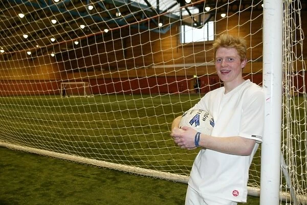 Chris Burke of Rangers FC: Toughing Out the Storm in Windstopper Gear