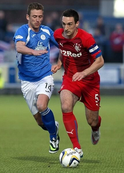 Clash at Palmerston Park: Lee Wallace vs Stephen McKenna in Scottish Championship Action - Champions Collide