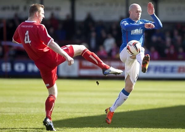 Clash on the Pitch: A Battle for the Ball - Rangers Nicky Law vs Brechin City's Graham Hay (Scottish League One, 2003)