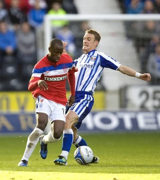 Clash of Talents: Sone Aluko vs. Dean Shiels - A Key Moment in Kilmarnock's 1-0 Victory over Rangers in the Scottish Premier League