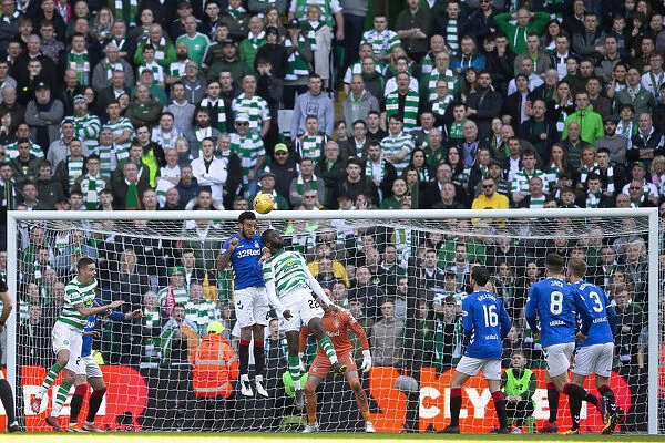 Connor Goldson Heads the Ball: Celtic Park Showdown - Scottish Premiership Clash Between Rangers and Celtic (2003 Scottish Cup Winners)