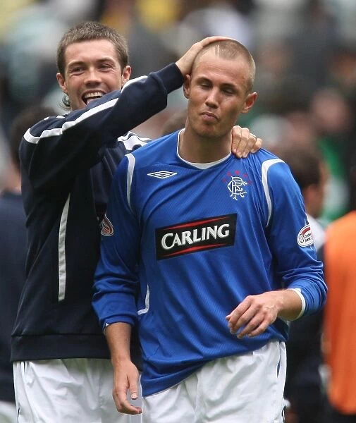 Consolation and Triumph: Jordan McMillan Comforts Kenny Miller after Rangers 4-2 Victory over Celtic