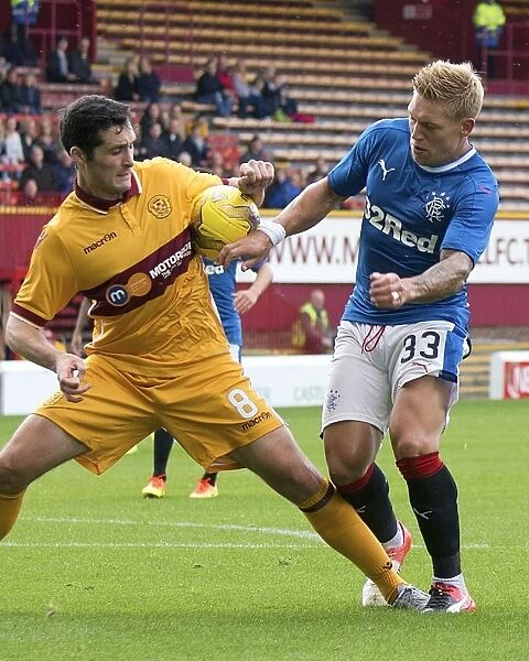 Controversial Clash: Waghorn vs. McHugh - Motherwell vs. Rangers in Betfred Cup: Intense Moment of Handball Allegations