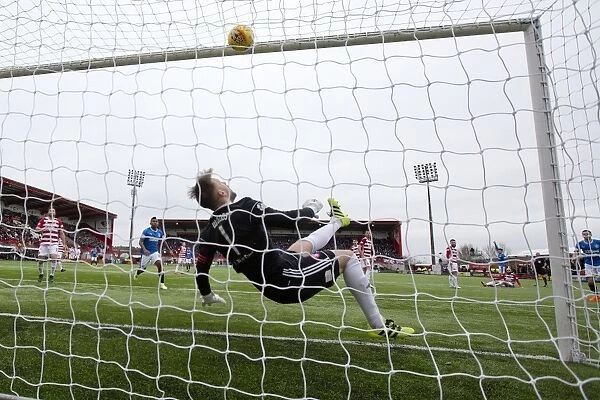 Controversial Goal: Josh Windass Scores for Rangers as Hamilton's Gary Woods Drops the Ball