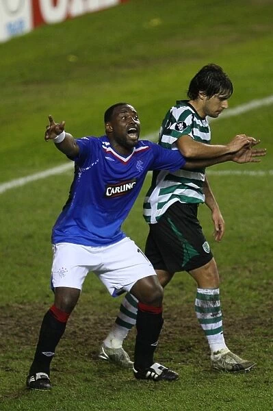 Darcheville's Reaction: A Silent Battle at Ibrox - Rangers vs. Sporting Lisbon, UEFA Cup Quarterfinal (0-0)