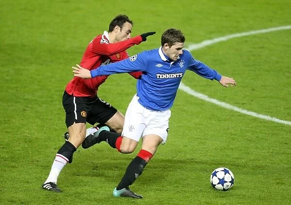 Dimitar Berbatov vs Kyle Hutton: Manchester United's Edge in UEFA Champions League Group C (Rangers 0-1 Manchester United)