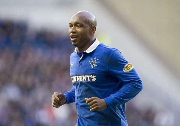 El Hadj Diouf's Five-Goal Blitz: Rangers Dominant 6-0 Victory over Motherwell at Ibrox (Clydesdale Bank Scottish Premier League)
