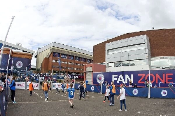 Electric Atmosphere: Rangers Fan Zone - Scottish Premiership Showdown at Ibrox Stadium: Rangers vs Heart of Midlothian (Scottish Cup Champions 2003)