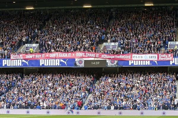 Electrifying Fan Zone Unity: Passionate Rangers Supporters Rally at Ibrox Stadium during the 2003 Scottish Cup Win