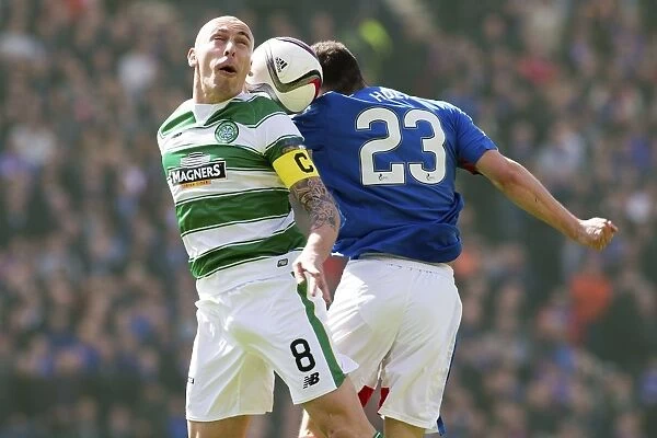 The Epic Scottish Cup Semi-Final Clash at Hampden Park: A Battle Between Rangers Jason Holt and Celtic's Scott Brown