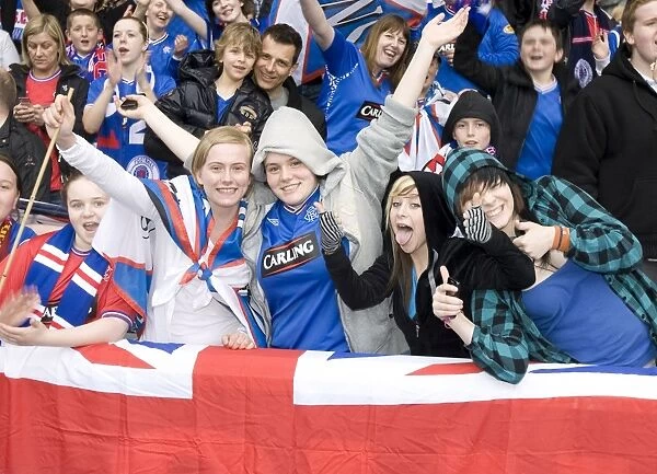 Euphoria at Ibrox: Rangers Football Club - SPL Champions 2009-2010: Hibernian vs Rangers - Fans Celebrate