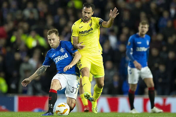 Europa League Showdown: A Battle Between Rangers Scott Arfield and Villarreal's Mario Gaspar