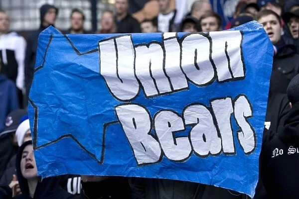 Exultant Rangers Fans Celebrate 4-0 Victory over Queens Park with Union Bears Banner at Ibrox Stadium