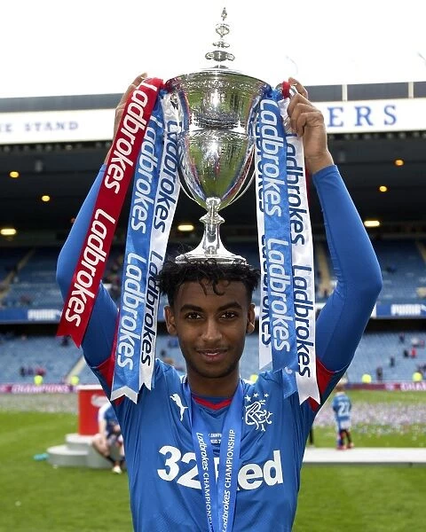 Gedion Zelalem's Triumph: Lifting the Ladbrokes Championship Trophy at Ibrox Stadium