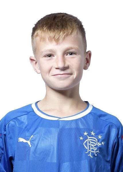 The Next Generation of Champions: Elliot Dunlop and Rangers U12 Holding the Scottish Cup