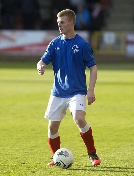 Glasgow Cup Final 2013: Thrilling Showdown - Jamie Mills Unforgettable Performance for Rangers vs. Celtic at Firhill Stadium